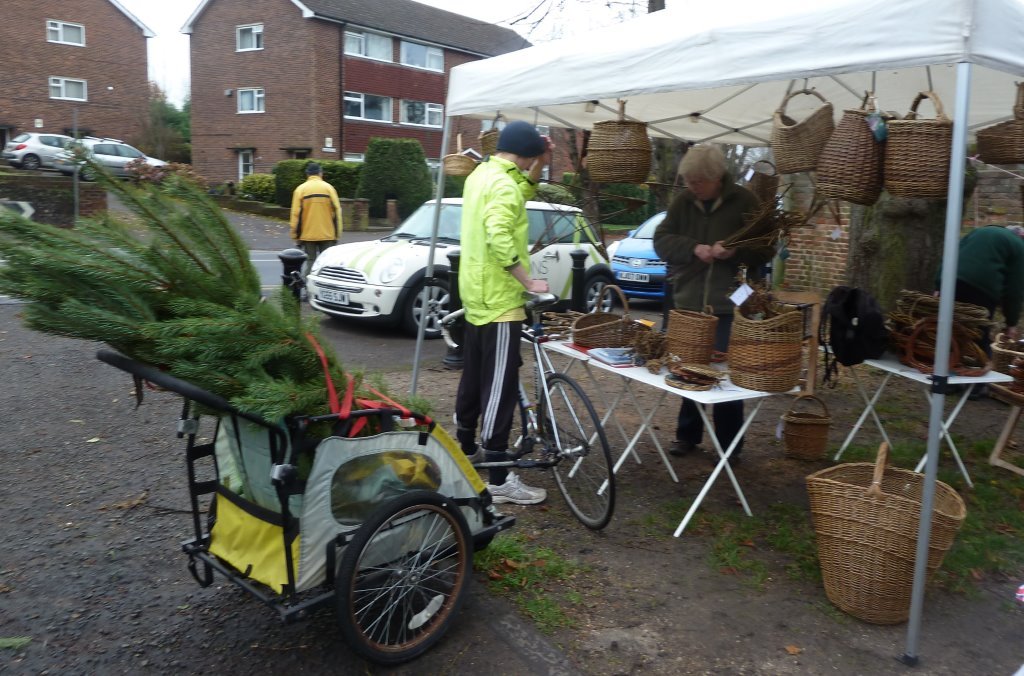 Customer loads tree in to car